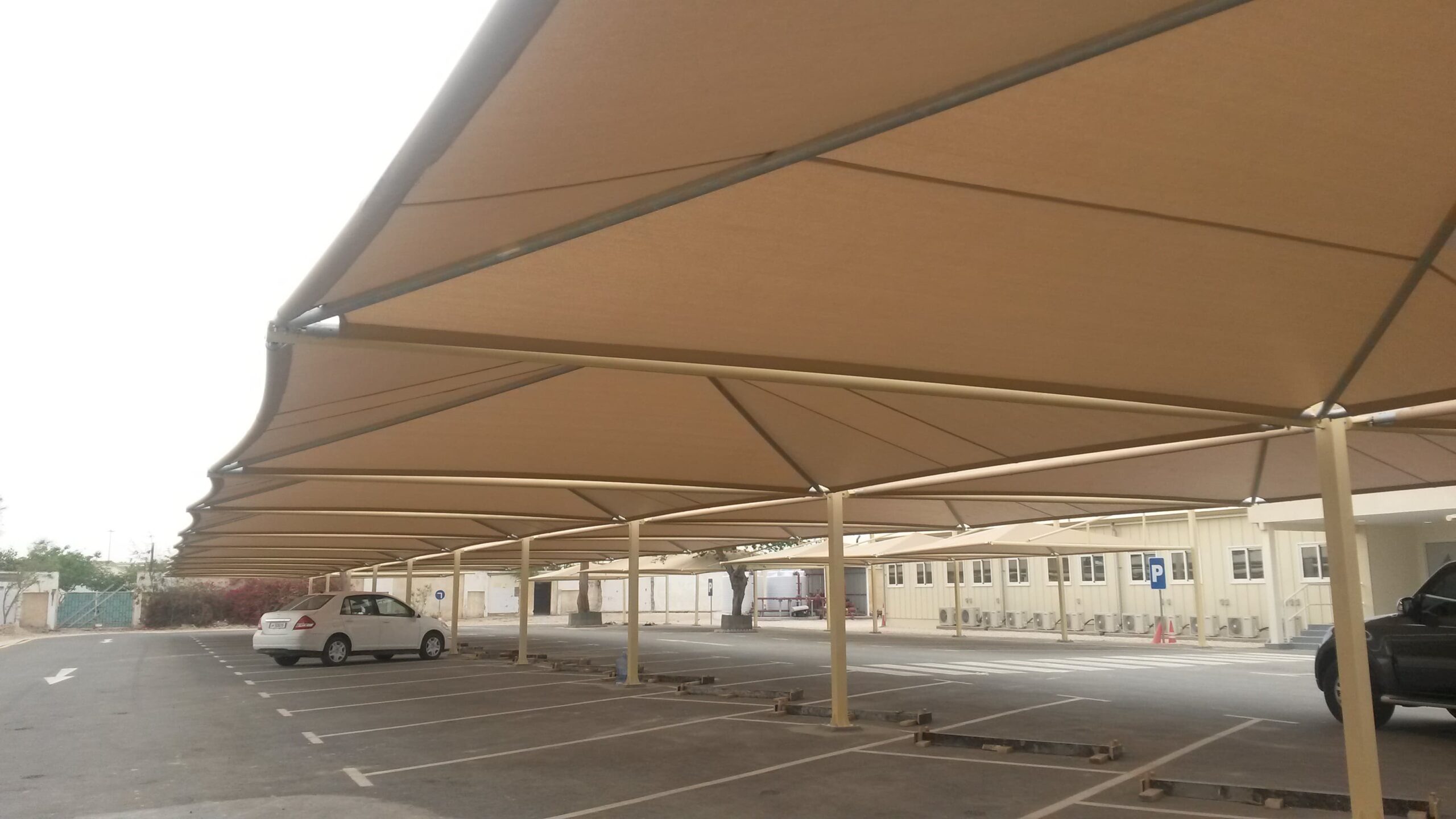 Car parking shade manufacturer Dubai real HDPE structure
